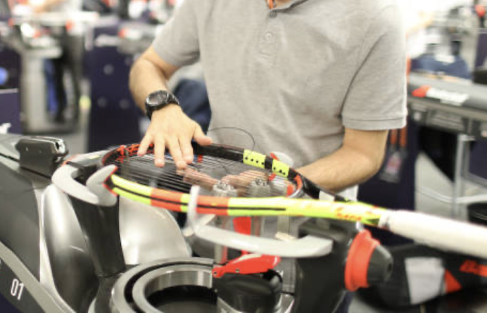 Babolat racquet being restrung